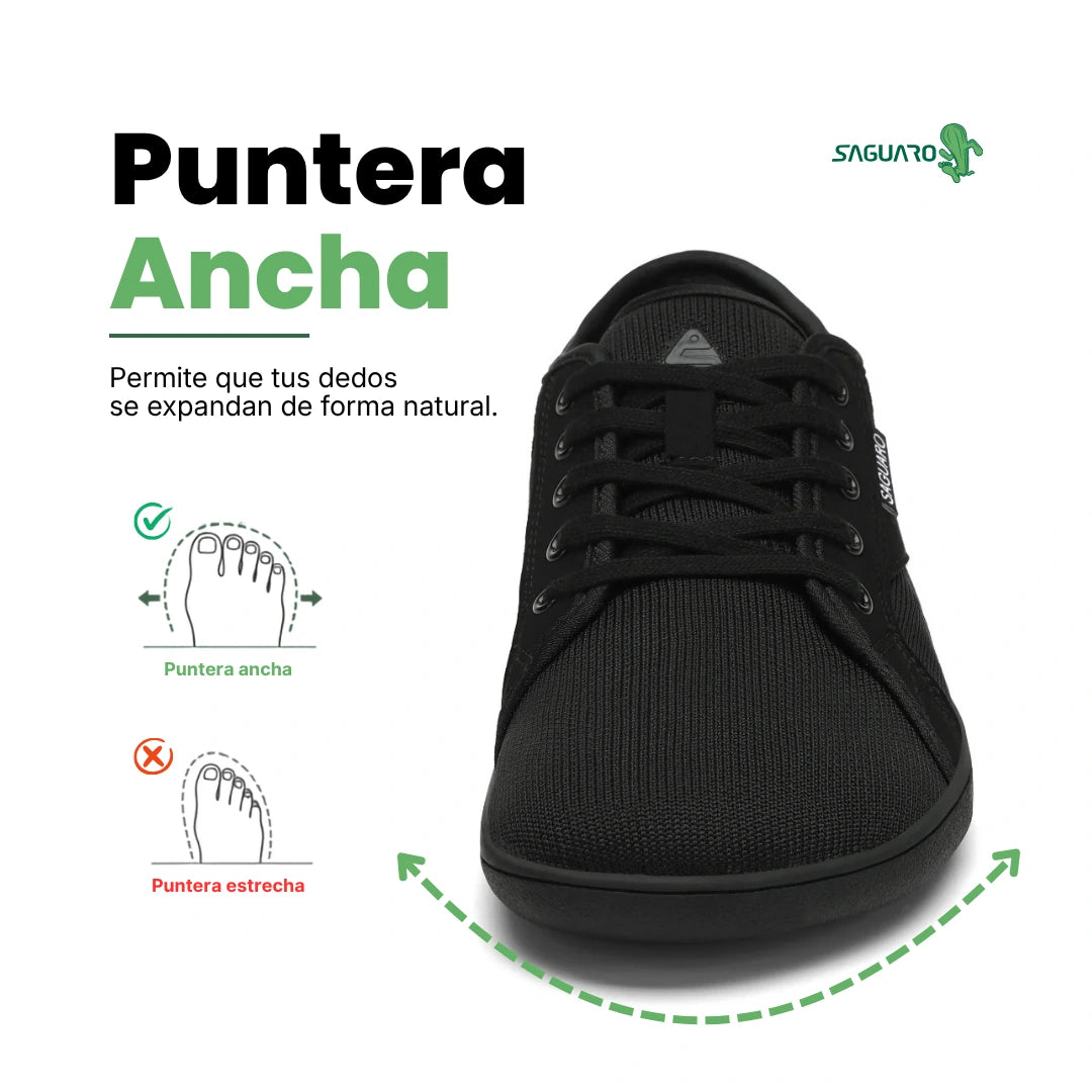 Zapatilla barefoot urbana frontal negra, suela delgada zero drop.