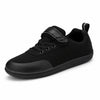Zapato escolar barefoot negro para niño con puntera reforzada y suela flexible.